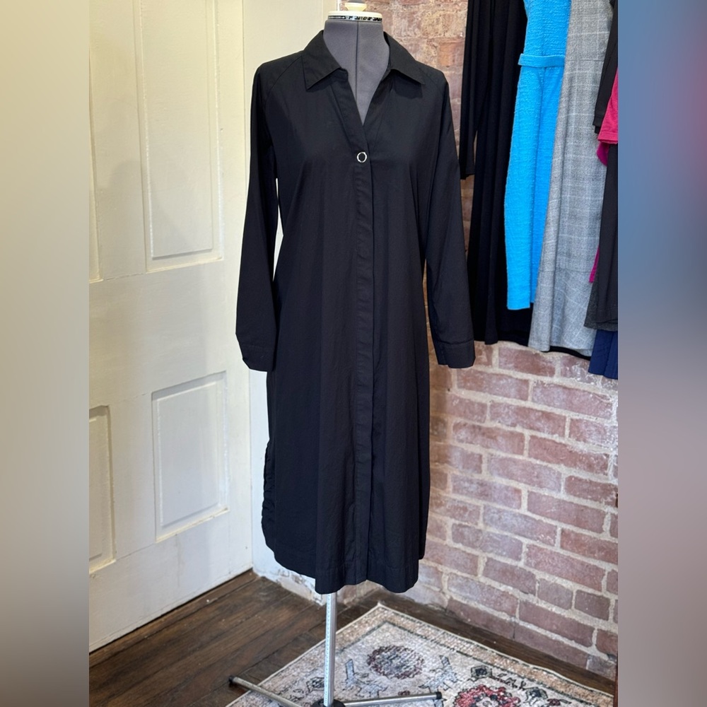 Chico’s Size 12/14 Black Dress with roll up sleeves and pockets.